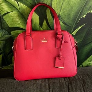 Brand new pink Kate spade purse.